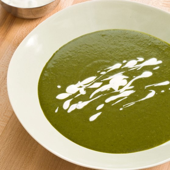 Super greens soup with lemon-tarragon cream