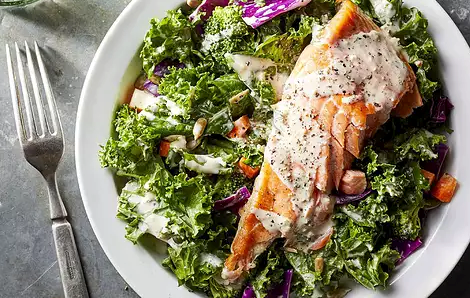 Superfood chopped salad with salmon & creamy garlic dressing