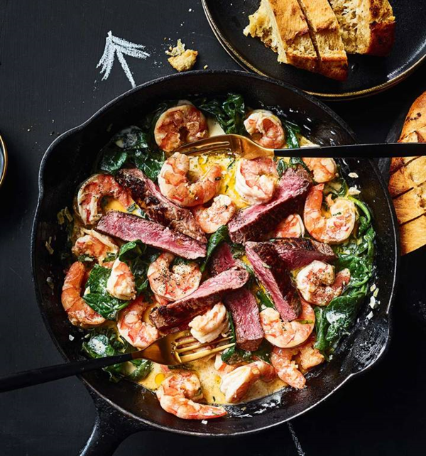 Surf and turf skillet with garlic dippers