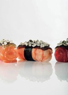 'Sushi nigiri' sashimi tuna, seared smoked ocean trout and poached banana prawn
