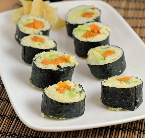Sushi with curry-roasted sweet potatoes, avocado, and cardamom millet rice