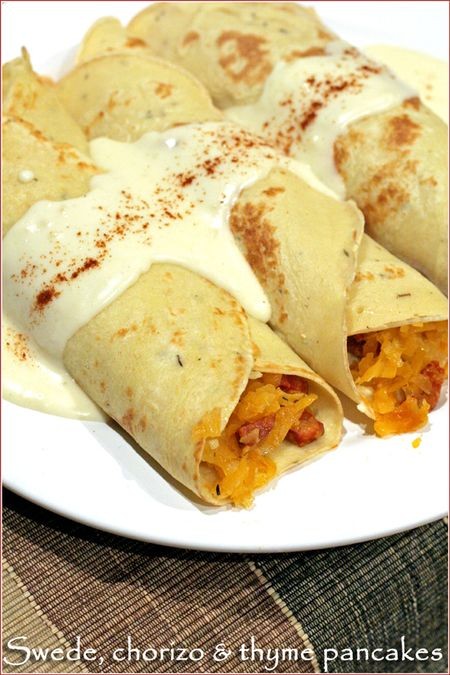 Swede/rutabaga, chorizo and thyme savoury crepes with cheese sauce