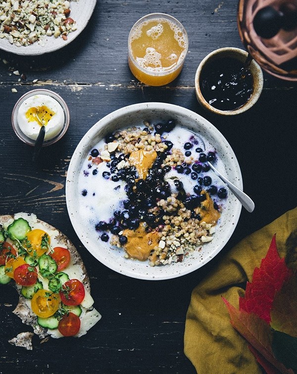 Swedish breakfast [buckwheat & cardamom porridge with blueberries; crisp bread sandwich]