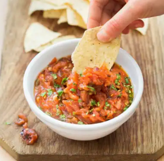 Sweet and smoky grilled tomato salsa