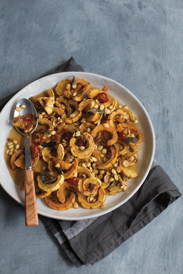 Sweet and sour delicata squash with red chiles, sage and its own seeds