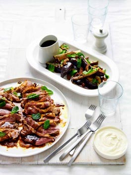 Sweet and sour eggplant with roast almonds and spice-rubbed lamb