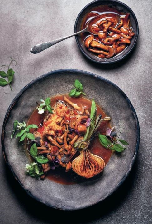Sweet and sour nameko mushrooms with fried tofu and spring onions
