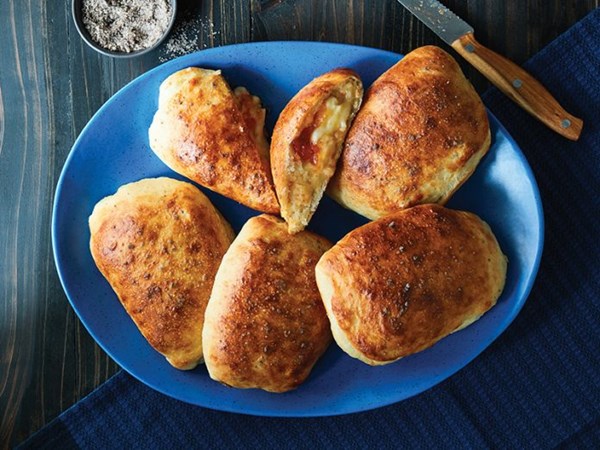 Sweet and spicy roasted garlic- and Brie-stuffed flatbreads