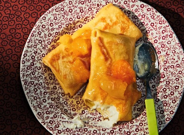Sweet cheese blintzes with lemony apricot compote