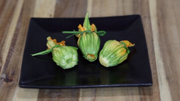 Sweet corn and chive-stuffed squash blossoms