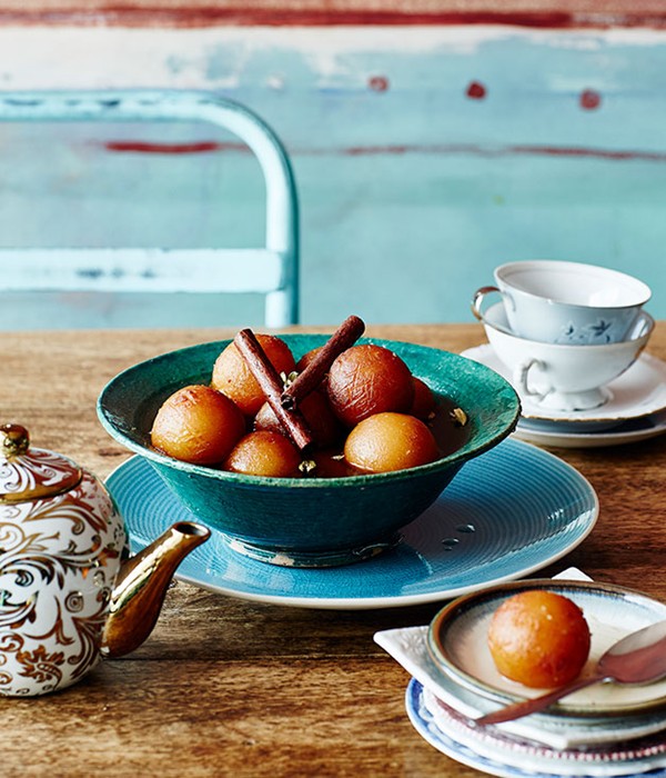 Sweet dumplings in rose and cardamom syrup (Gulab jamun)