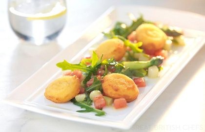 Sweet garlic galettes with a salad of asparagus and plum tomatoes