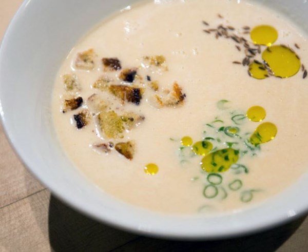 Sweet onion soup with caraway and croutons