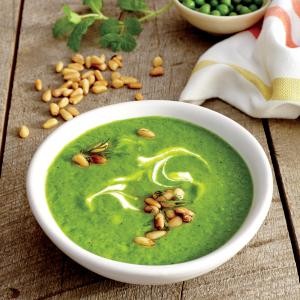 Sweet pea soup with yogurt and pine nuts
