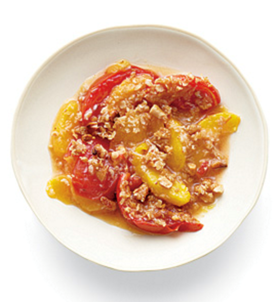 Sweet peach and tomato crisp with coconut-cashew topping