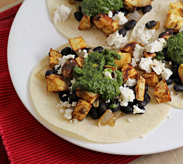 Sweet potato and black bean tacos with Swiss chard pesto