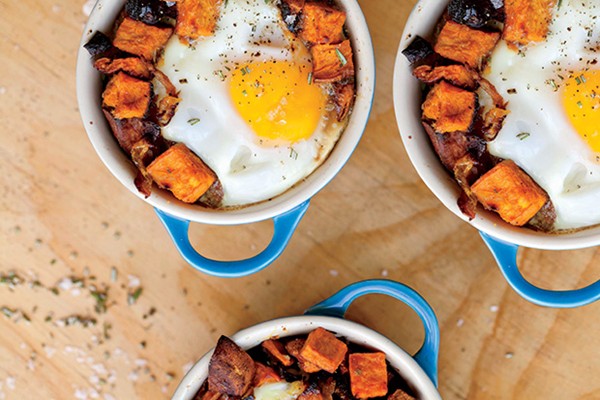Sweet potato and caramelized onion hash with baked eggs
