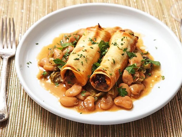 Sweet potato and mushroom cannelloni with braised escarole and butter beans
