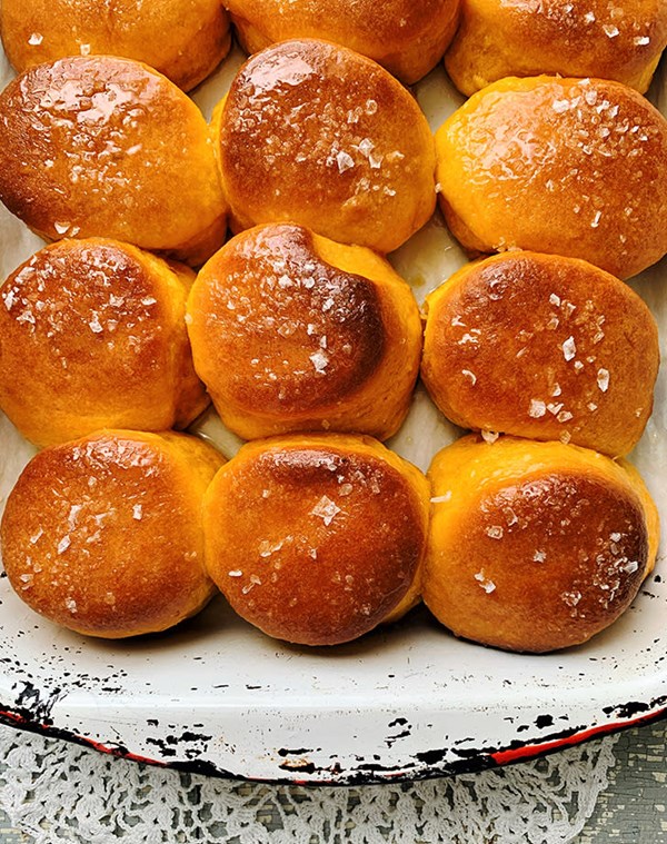 Sweet potato biscuit rolls with honey butter glaze