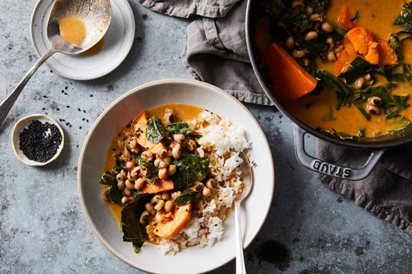 Sweet potato-coconut curry with black-eyed peas & collard greens