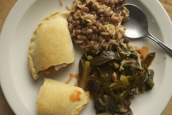 Sweet potato empanadas with peas, rice and collards