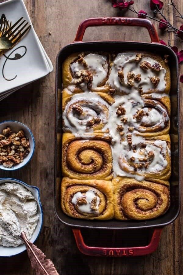 Sweet potato pie cinnamon rolls with butter whipped meringue frosting