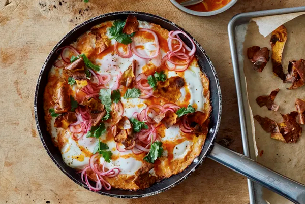 Sweet potato shakshuka with sriracha butter & pickled onions from Ottolenghi Test Kitchen