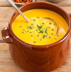 Sweet potato soup with bacon and chives