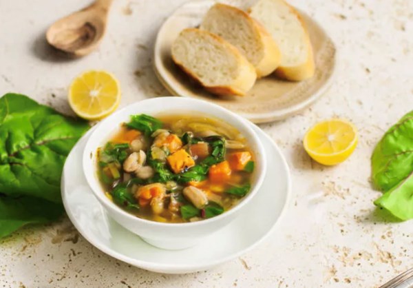 Sweet potato soup with beans and chard