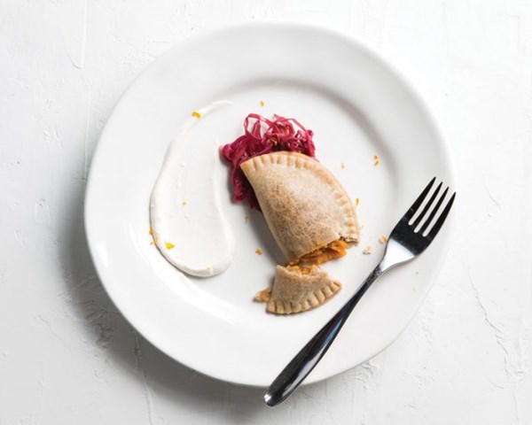 Sweet potato turnovers with sweet kraut & vegan orange sour cream