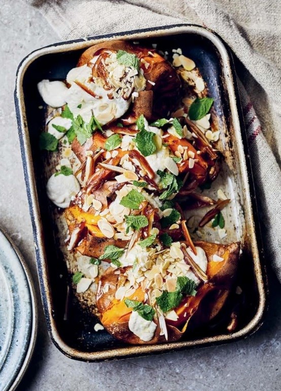 Sweet potatoes with almond sauce, dates and chopped mint