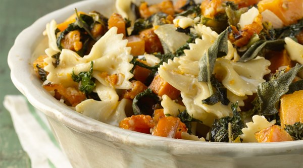 Sweet roasted butternut squash and greens over bow-tie pasta