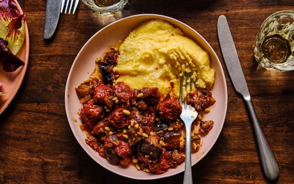 Sweet-savoury sausage and aubergine ragu with cheesy polenta