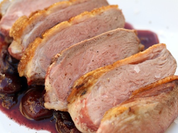 Sweet-tart duck breasts with fresh cherry sauce