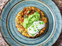 Sweetcorn and green chilli fritters with red pepper relish and avocado