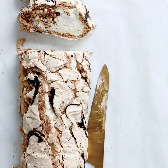 Swirled meringue roulade with praline whipped cream