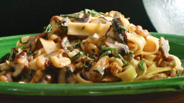 Swiss brown caps with walnuts and blue cheese on tagliatelle