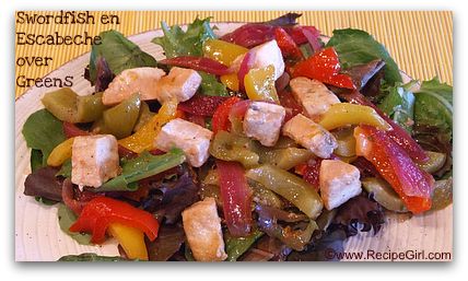 Swordfish en escabeche over greens