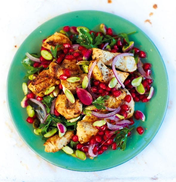 Swordfish with pomegranate, onion and pistachio salad