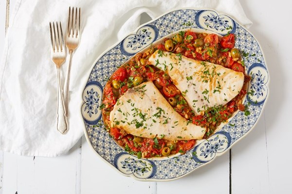 Swordfish with tomatoes, olives and capers (Pesce spada alla ghiotta)