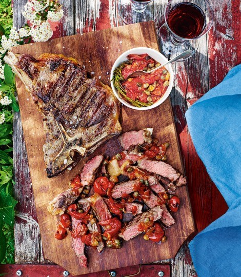 T-bone steaks with tomato, caper and rosemary sauce