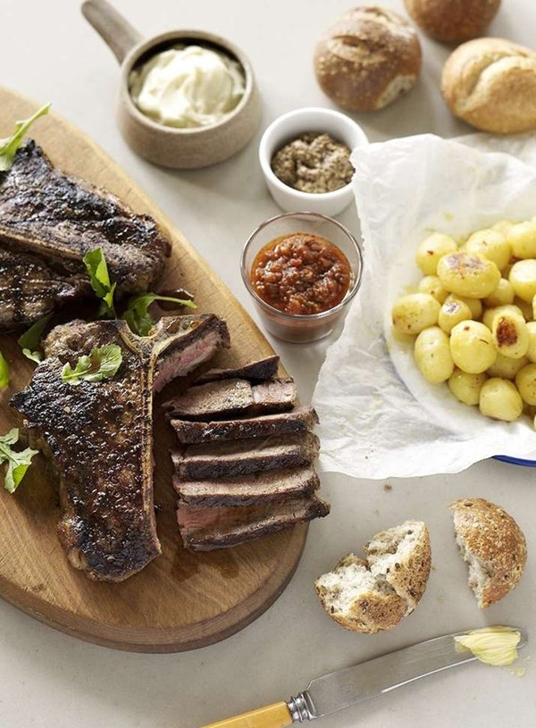 T-bone with new potatoes and rosemary