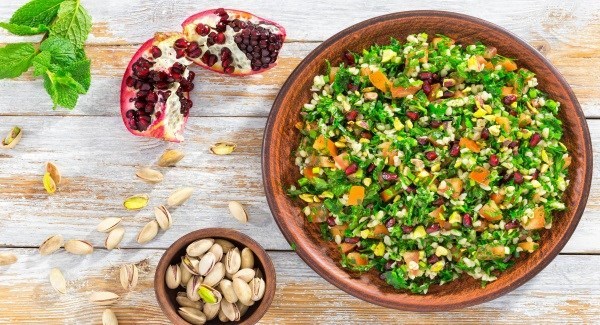 Tabouleh with pomegranate seeds and apple