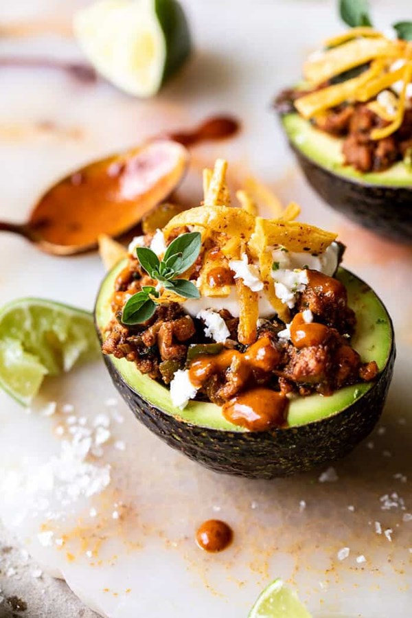 Taco stuffed avocados with chipotle sauce and cilantro lime ranch