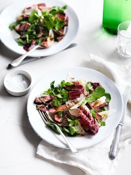 Tagliata salad with warm garlic and anchovy dressing