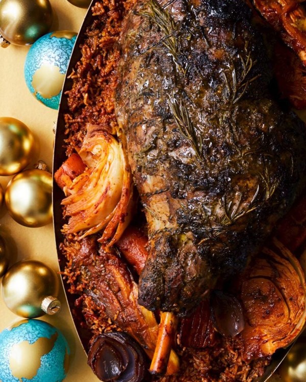 Tamarind and herb-stuffed lamb with baked jollof rice 
