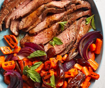 Tamarind-glazed flank steak with carrots & dates