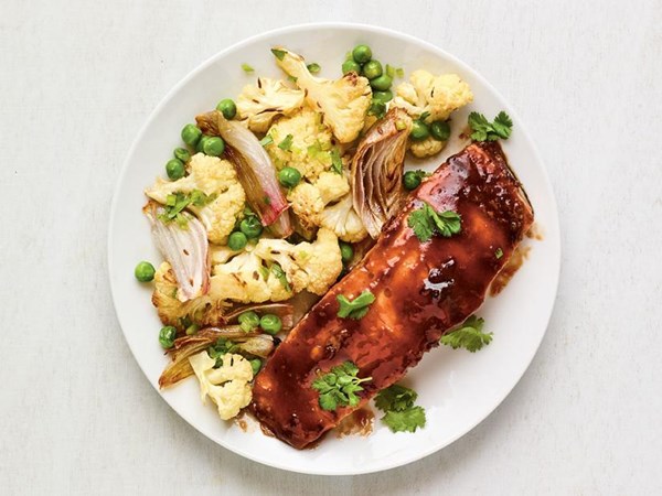 Tamarind-glazed salmon with cauliflower and peas