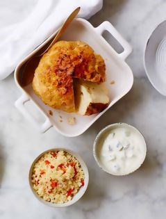 Tandoori whole roast cauliflower with raita and cous cous