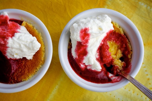 Tangerine pudding cake with raspberry coulis